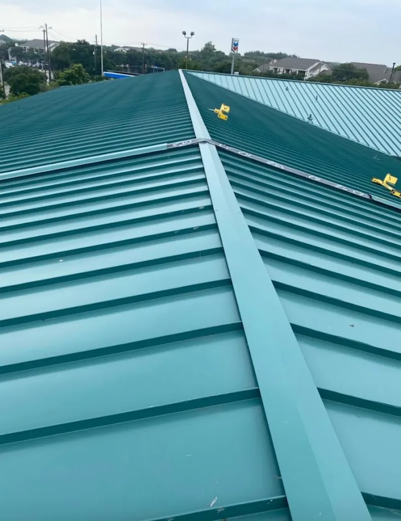 Green commercial metal roof ridge and valley for Metal Roof Repair in Southbridge Town